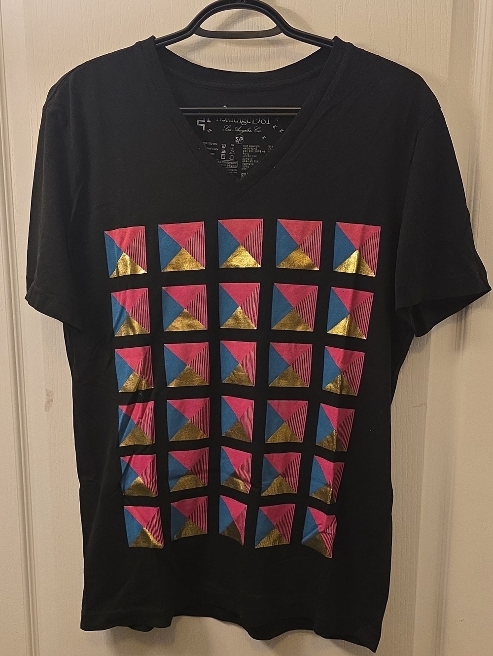 Black V-Neck Graphic Tee with Pink, Blue & Gold Geometric Print